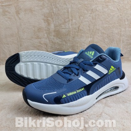 adidas Boost running shoes in a blue colorway with white